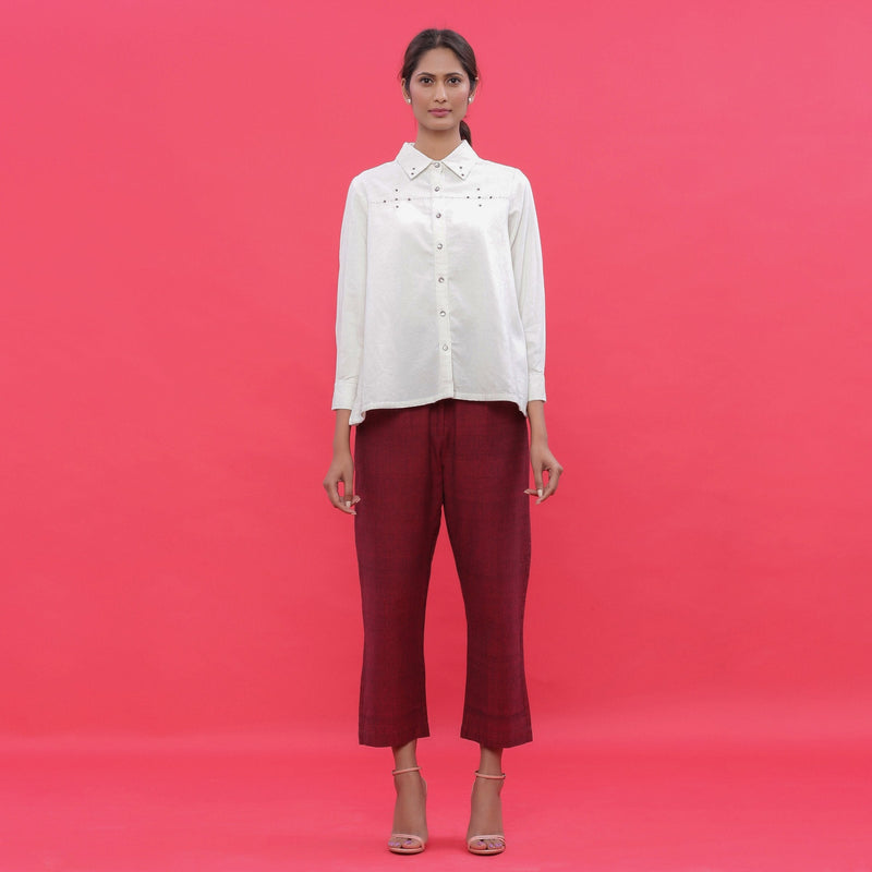 Front View of a Model wearing White Corduroy Hand-Beaded Shirt