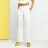 Front View of a Model wearing White Cotton Schiffli Paneled Pant