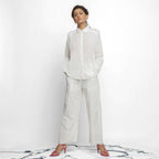 Front View of a Model wearing White Cotton Lined Button-Down Top