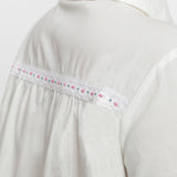 Back Detail of a Model wearing White Cotton Lined Button-Down Top