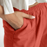 Front Detail of a Model wearing Red Wide Legged Straight Pant