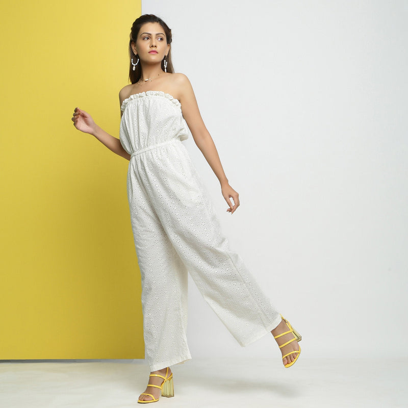 Front View of a Model wearing White Cotton Schiffli Floral Jumpsuit