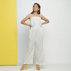 Front View of a Model wearing White Cotton Schiffli Floral Jumpsuit