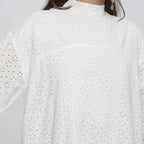 Front Detail of a Model wearing White Cotton Schiffli Floral Yoked Dress