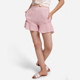 Front View of a Model wearing White Crinkled Cotton Frilled Shorts