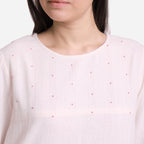 Front Detail of a Model wearing White Hand Beaded Striped Shift Dress