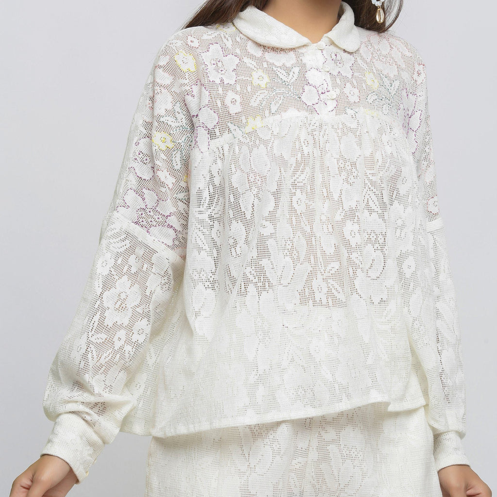 Front Detail of a Model wearing White Hand-Embroidered Sheer Yoked Top