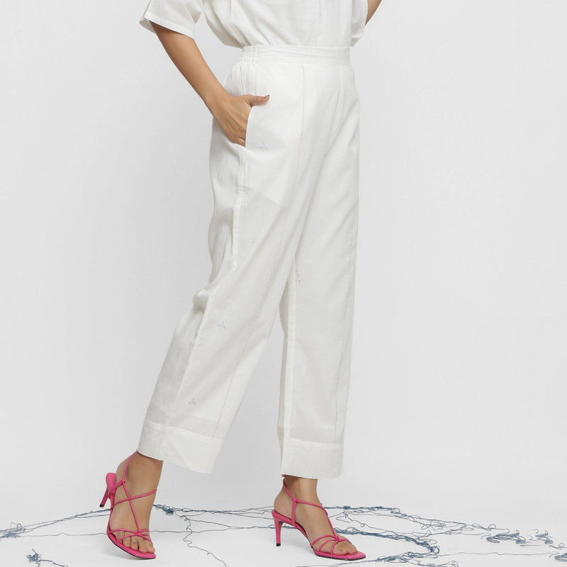 Right View of a Model wearing Off-White Banded Hem Straight Pant