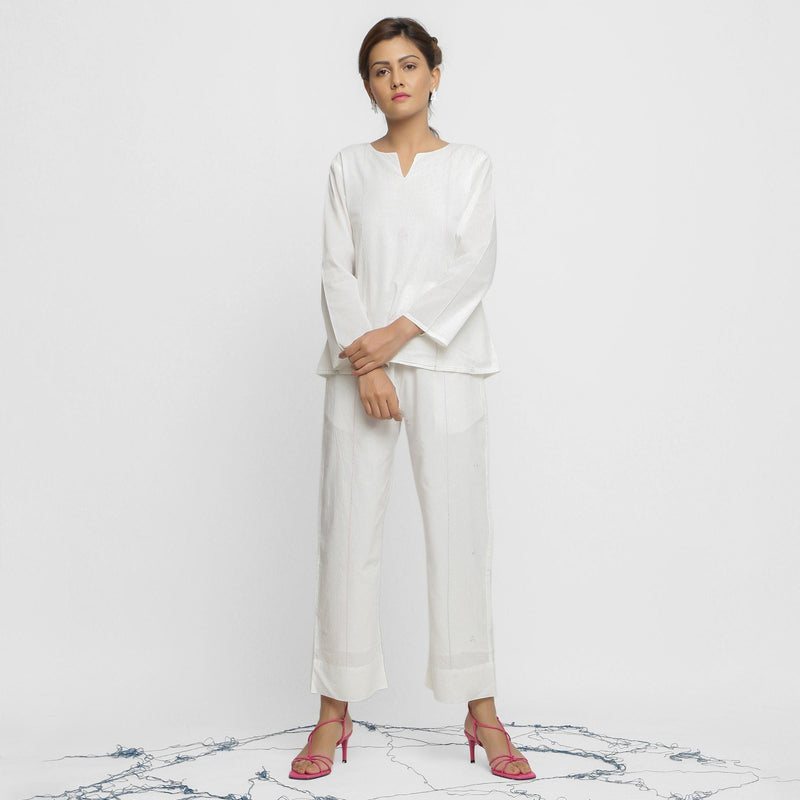 Front View of a Model wearing White Organic Cotton Top and Banded Hem Pant