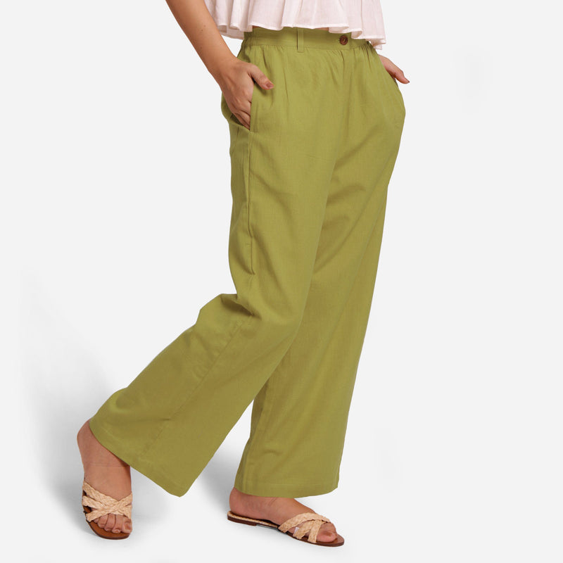 Right View of a Model wearing Olive Green Cotton Flax Wide Legged Straight Pant