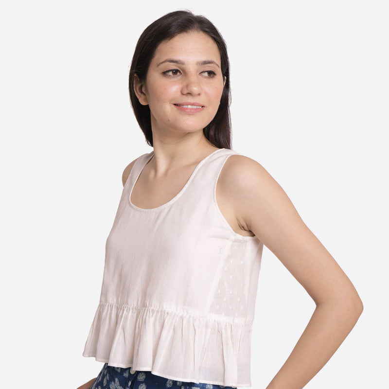 Right View of a Model wearing White Round Neck Cotton Peplum Top