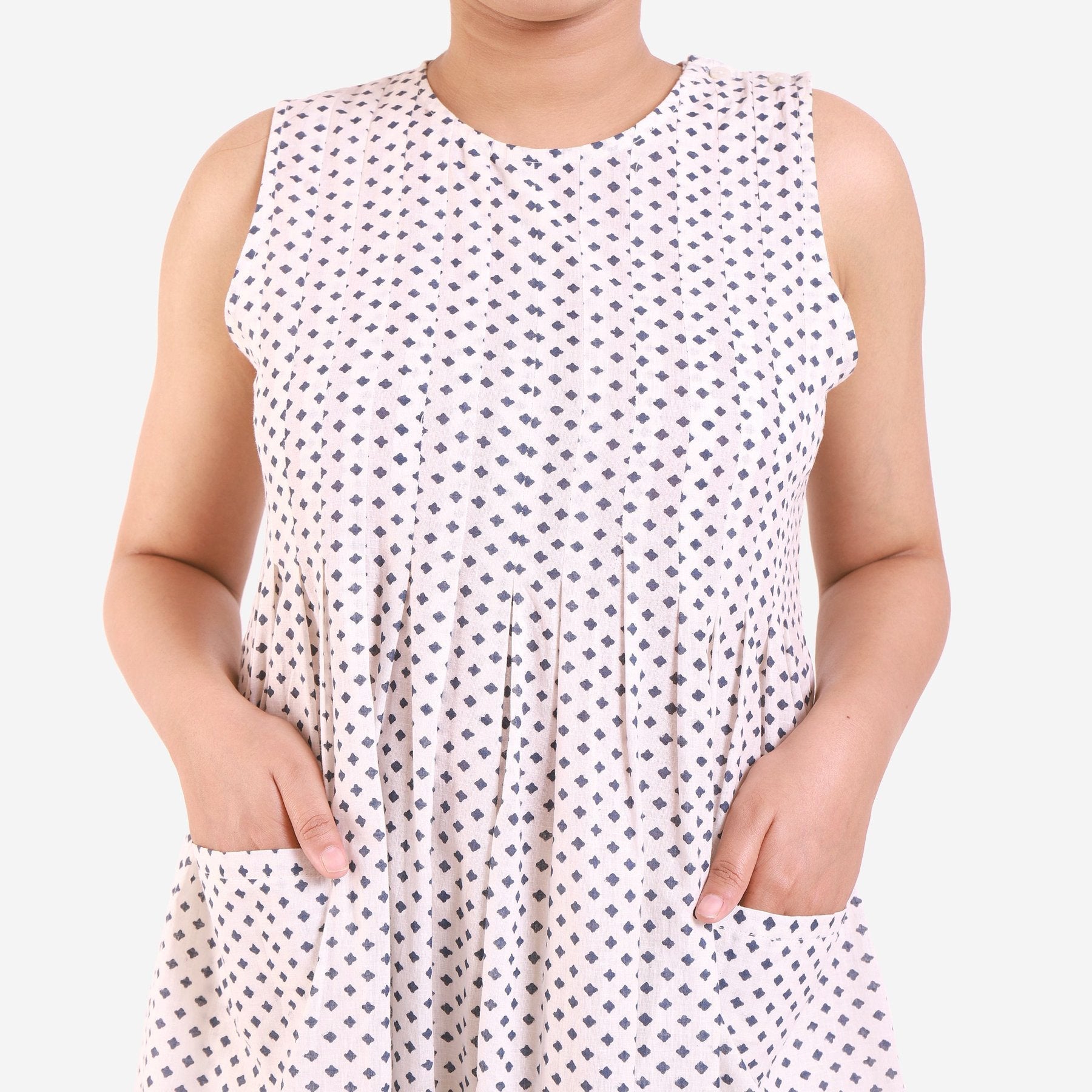Front Detail of a Model wearing White Printed Sleeveless Flared Dress