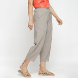 Right View of a Model wearing Yarn Dyed Cotton Beige Paneled Pant