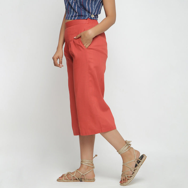 Left View of a Model wearing Brick Red Cotton High Rise Culottes