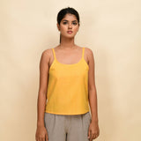 Front View of a Model wearing Yellow 100% Cotton Relaxed Fit Spaghetti Top