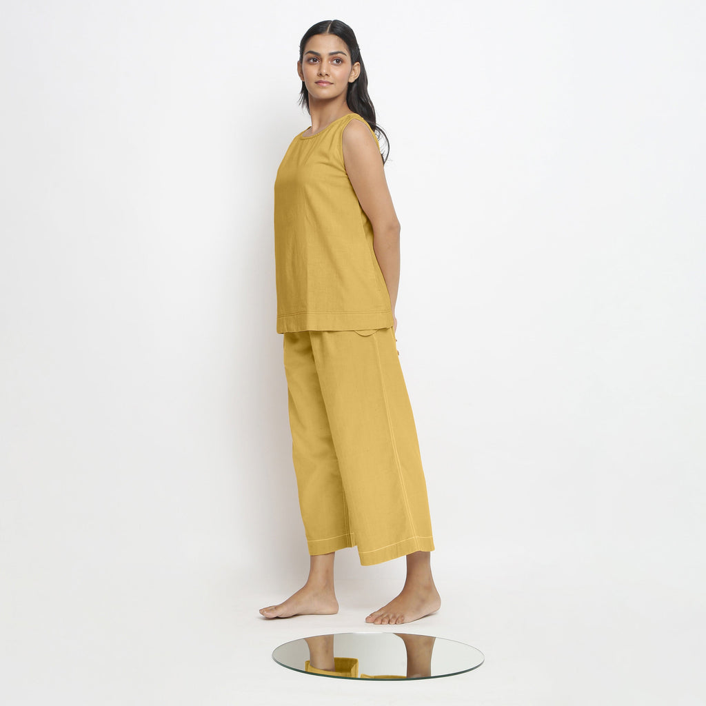 Left View of a Model wearing Yellow A-Line Top and Wide-Legged Pant Set