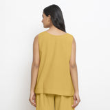 Back View of a Model wearing Vegetable Dyed yellow Boat Neck A-Line Top