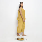 Right View of a Model wearing Yellow A-Line Top and Wide-Legged Pant Set