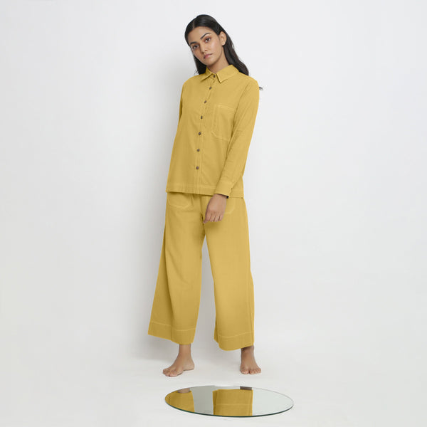 Front View of a Model wearing Yellow Button-Down Top and Pant Set