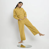 Front View of a Model wearing Yellow Button-Down Top and Pant Set