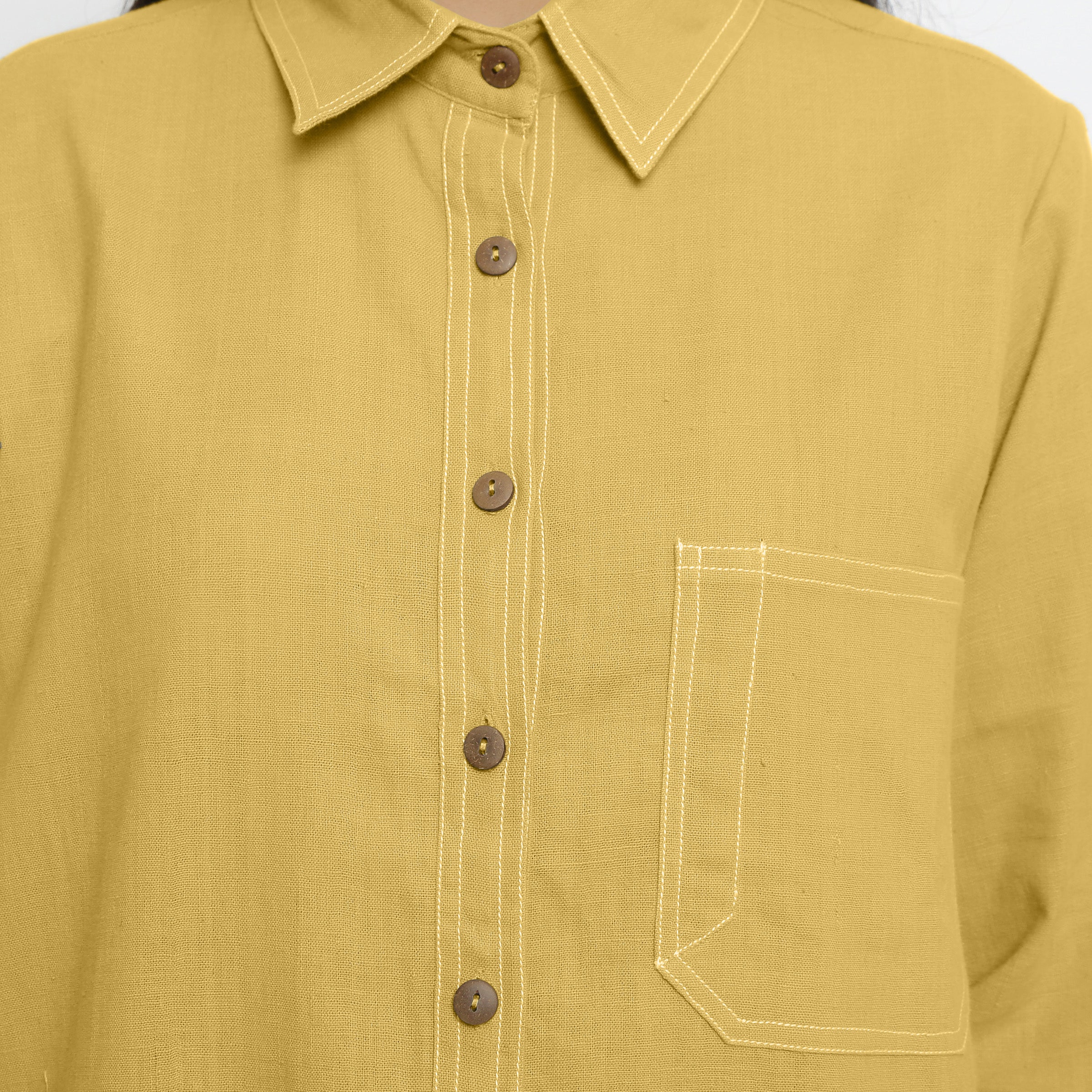 Front Detail of a Model wearing Vegetable Dyed Yellow Button-Down Cotton Top