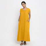 Front View of a Model wearing Yellow Cotton Flax A-Line Paneled Dress