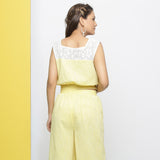 Back View of a Model wearing Yellow Cotton Lace Hand-Embroidered Crop Top