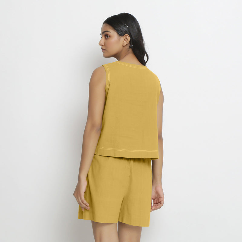 Back View of a Model wearing Yellow Handspun Cotton Vegetable Dyed Crop Top
