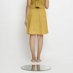 Back View of a Model wearing Vegetable-Dyed Light Yellow 100% Cotton Mid-Rise Skirt