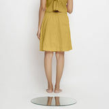 Back View of a Model wearing Vegetable-Dyed Light Yellow 100% Cotton Mid-Rise Skirt