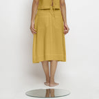Back View of a Model wearing Light Yellow Vegetable Dyed Button-Down Skirt