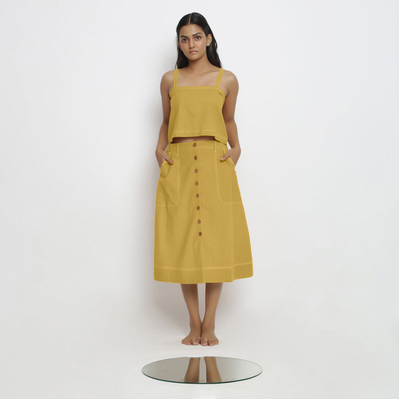 Front View of a Model wearing Yellow Spaghetti Top and Yellow Skirt Set
