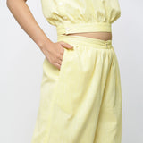 Right Detail of a Model wearing Yellow Yarn Dyed Cotton Flared Culottes