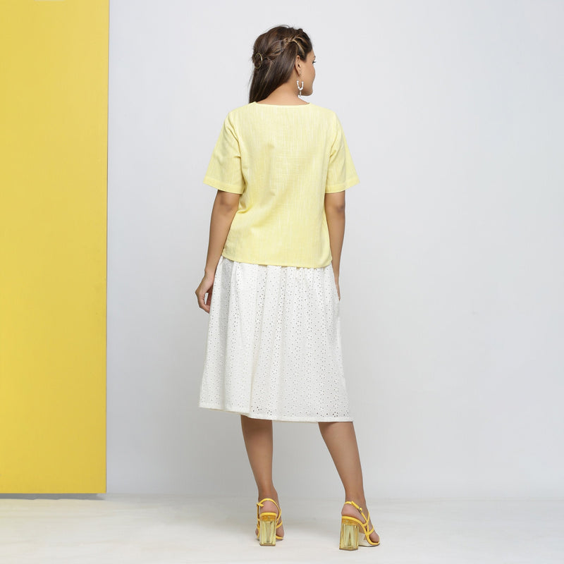 Back View of a Model wearing Yellow Yarn Dyed Cotton High Low Top