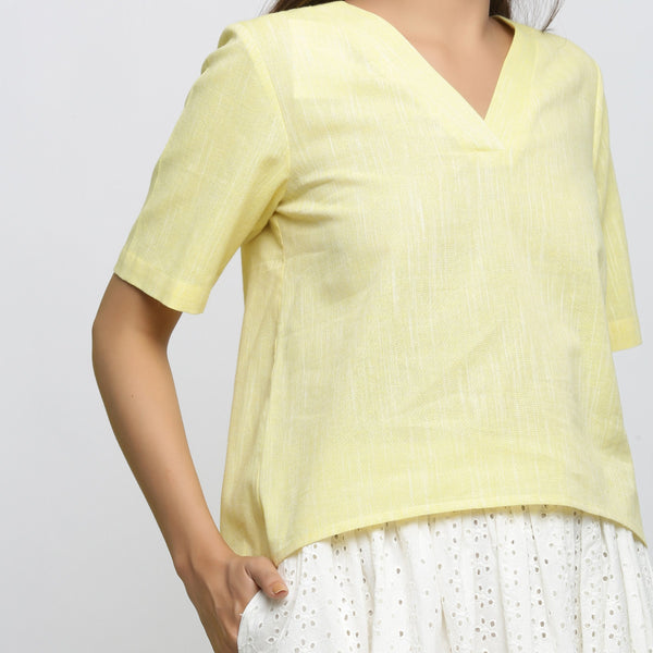 Front Detail of a Model wearing Yellow Yarn Dyed Cotton High Low Top